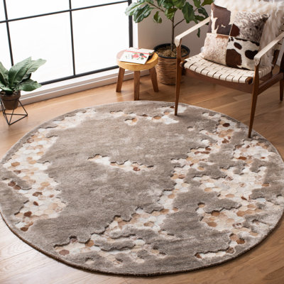 Tapis taupe en viscose / cuir / coton touffeté à la main Jarrell