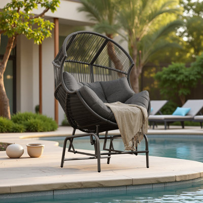 Fauteuil oscillant d'extérieur en osier
