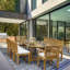 Dacia Outdoor 9 - Piece Teak Dining Set with Cushions
