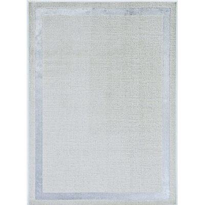 Tapis touffeté ivoire / argent
