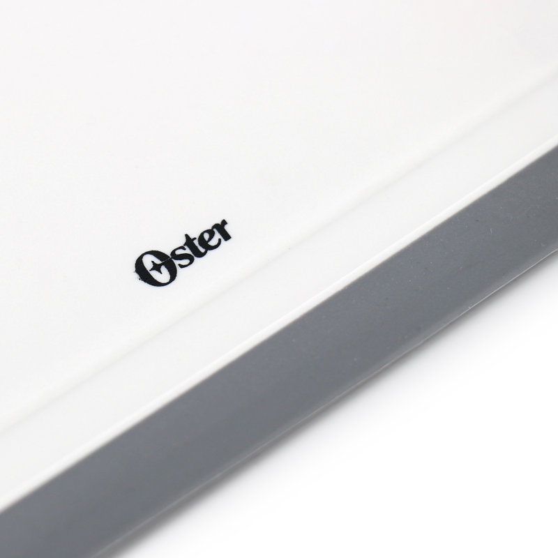 Oster Bergen 17x12 Inch Rectangular Plastic Cutting Board in White with Non-Slip Feet