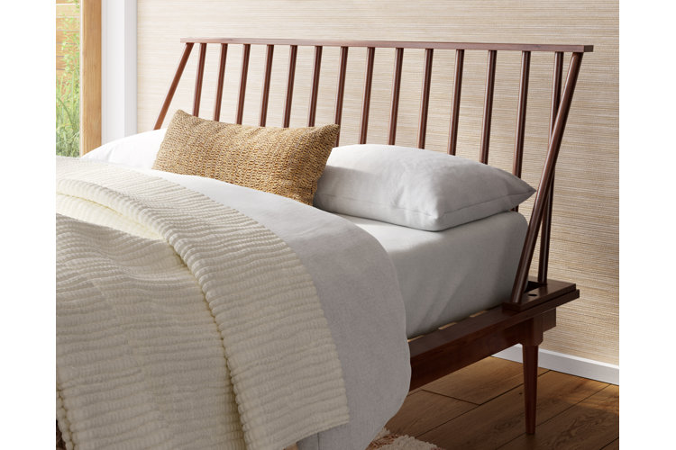 wood spindle bed with cotton sateen sheets