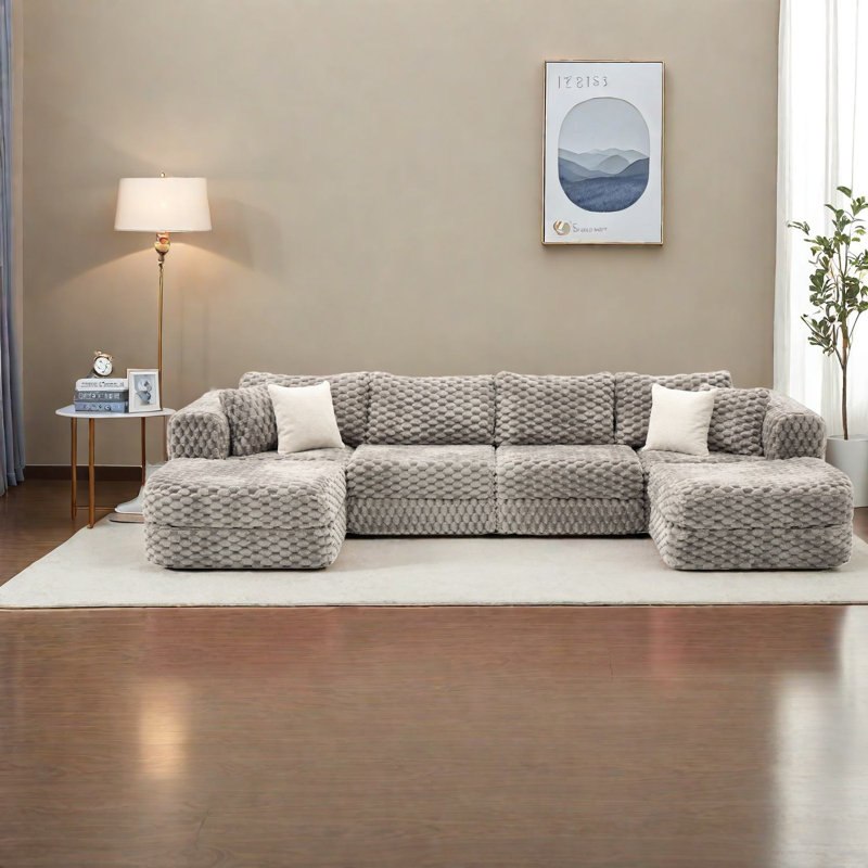 Canapé modulaire moderne gris en velours revêtu de repose-pieds mobile pour le salon