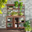 Grande table de rempart d'extérieur en bois avec 2 tiroirs, une armoire et des tablettes ouvertes-870718190
