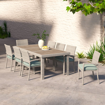 Ehrenfried 8-Person Wicker Patio Dining Set with Sunbrella Cushions