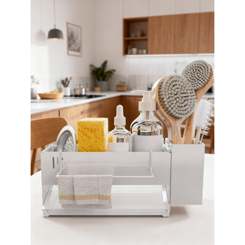 Organisateur de bac d'évier avec système de vidange automatique, éponge antirouille et porte-brosse pour un rangement de comptoir de cuisine peu encombrant