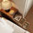 A Small Bedside Table With Drawers