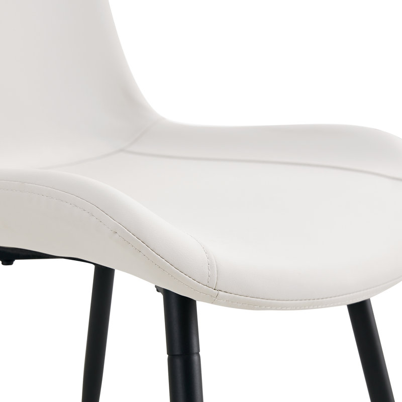 Ensemble de table de salle à manger moderne blanc avec coussins incurvés, verre et métal