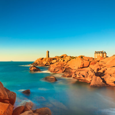 Ploumanach Lighthouse Sunset by StevanZZ - Wrapped Canvas Print