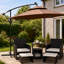 6 Piece Black Rattan Garden Furniture Set with Nesting Tables, 2 Armchairs, 2 Footstools and Cushions