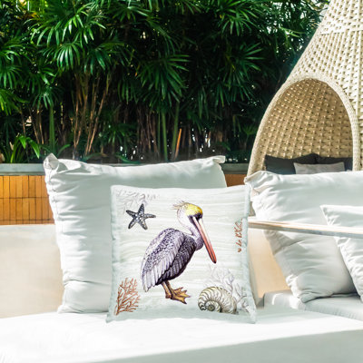 Coussin d'extérieur imprimé plage et pélican par Elena Vladykina
