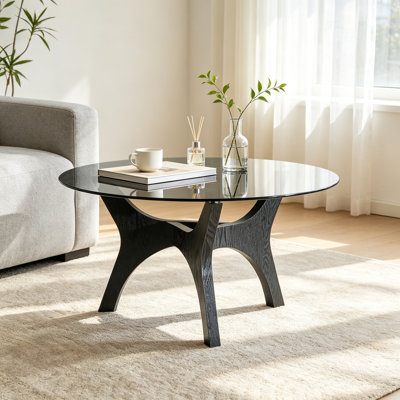 Table basse moderne de style Mid-Century de 80 cm (31,5 po), plateau en verre teinté gris, pieds incurvés en MDF à grain de bois noir, support stable à trois griffes pour la maison et le bureau
