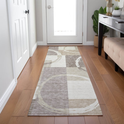 Tapis rectangulaire Aleh avec envers antidérapant