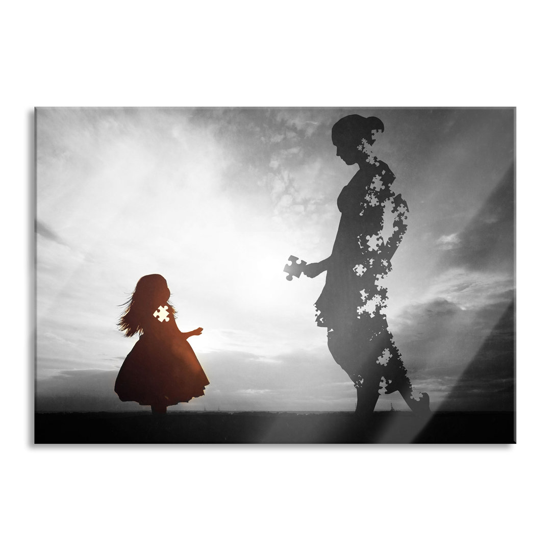 Glasbild Silhouette Puzzle Mutter und Kind