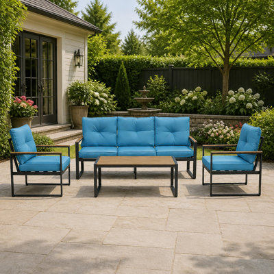 Ensemble de conversation extérieur surdimensionné en acier avec sièges larges et coussins épais pour la détente au jardin, dans la cour ou au bord de la piscine.