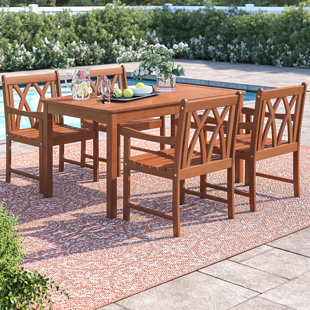 Dusek 4 - Person Wood Patio Dining Set with Rectangular Table