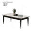 Table basse de style contemporain avec plateau en pierre frittée et pieds en flèches argentées avec finition noire et blanche