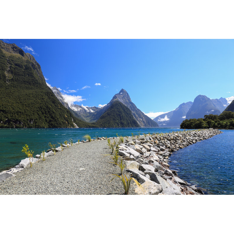 Mitre Peak In Fiordland National Park, Southern Island, New Zealand. by SangchaiOlanrittinunt - Wrapped Canvas Print