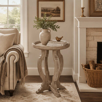 Élégante table d'appoint de style campagnard français avec piètement en forme de sablier et plateau rond à rebord, idéale pour ajouter une touche rustique à votre décoration.