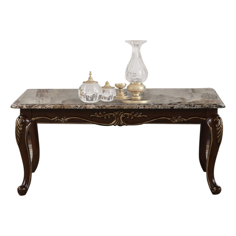 Table basse Gloria avec finition cerisier riche et plateau en marbre véritable, parfaite pour les espaces de vie élégants et fonctionnels