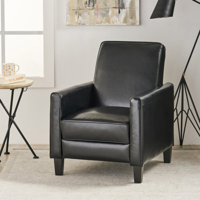 Fauteuil à dossier poussoir en cuir noir pour une décoration intérieure élégante