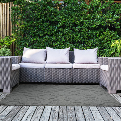 Tapis intérieur / extérieur gris touffeté quatre x 4 po Selig
