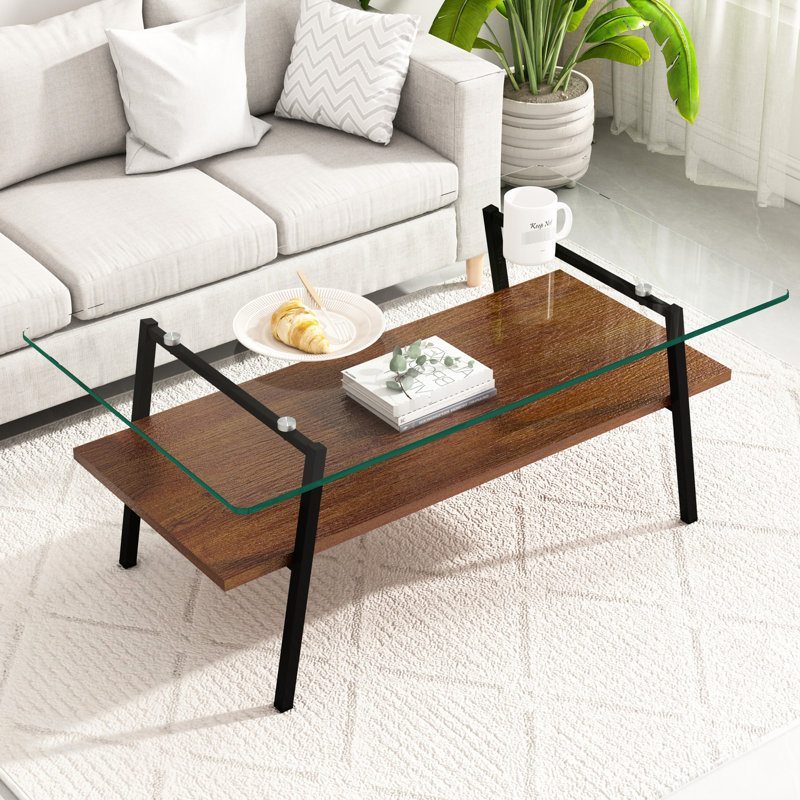 Table basse rectangulaire en verre trempé lisse et structure en métal robuste avec pieds transparents