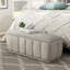 Banc de rangement spacieux en tissu taupe avec structure en contreplaqué et siège confortable