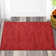 Ellicia Solid Color Polyester Area Rug in Red/Orange