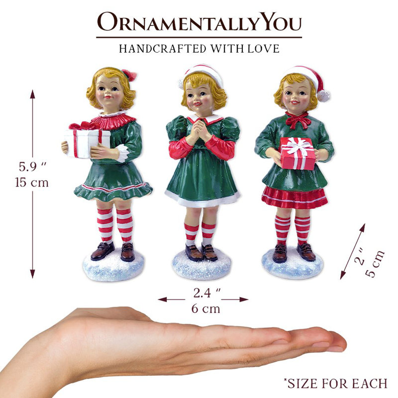 Ensemble de trois figurines élégantes de Noël victorien