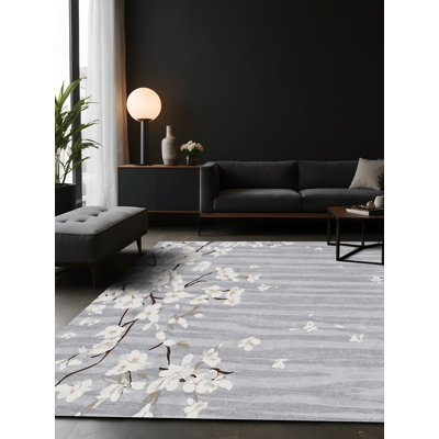 Tapis gris soyeux et moelleux