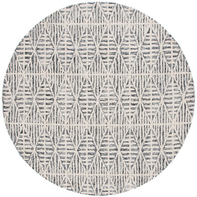 Jimya Hand Tufted Wool Viscose Cotton with Latex Geometric Rug in Black/Ivory
