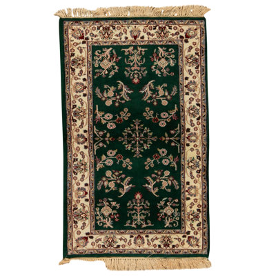 Hand Knotted Wool Area Rug in Dark Green And Ivory