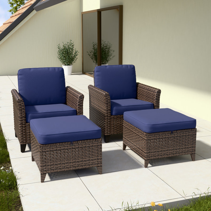 4-Piece Brown Wicker Patio Set with Blue Cushions and Ottomans