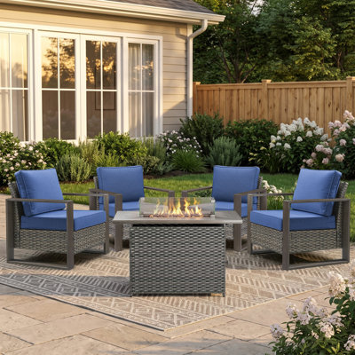 Fauteuil d'extérieur en osier pour 4 personnes et table de patio rectangulaire avec coussins Aldiana