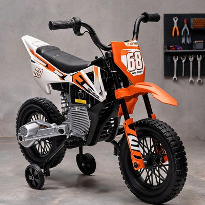 Moto électrique pour enfants avec roues d'entraînement et suspension arrière en orange riche