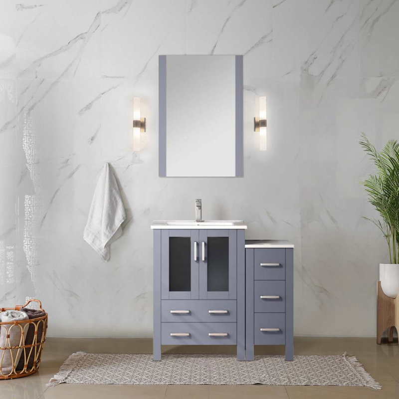 Ensemble de meuble-lavabo simple avec armoire latérale, comptoir en céramique blanche et robinet