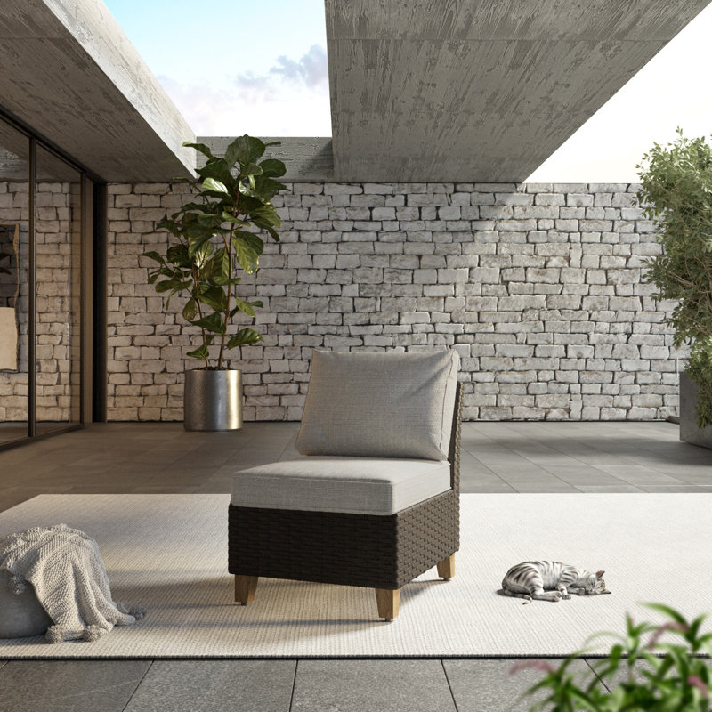 Chaise de patio en osier avec coussins amovibles Umeh, Gris