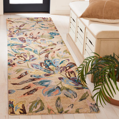 Karetha Hand Tufted Wool/Cotton Floral Rug in Purple/Beige