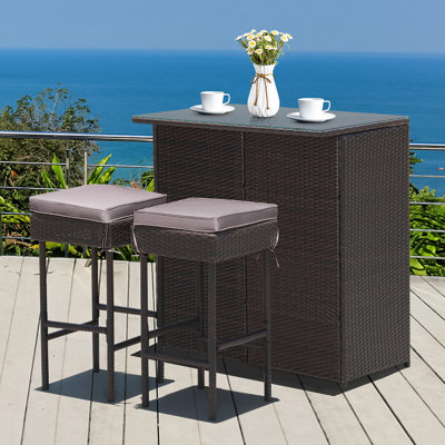 Cahmari 2 - Person Patio Dining Set with Rectangular Table , Cushions Included