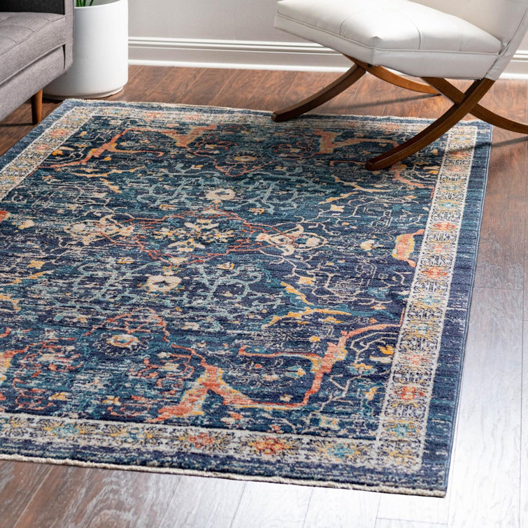 Tapis bleu marine à motif floral Alkire