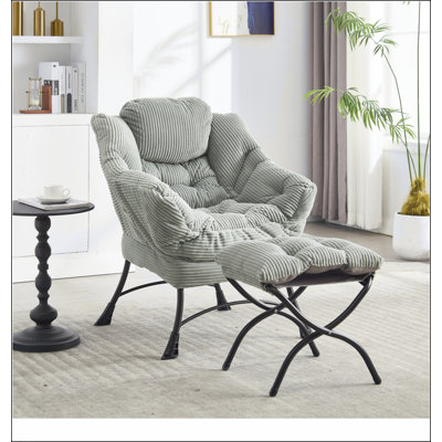 Méridienne moderne avec repose-pieds, accoudoirs et poche latérale pour une lecture confortable et une détente dans les petits espaces