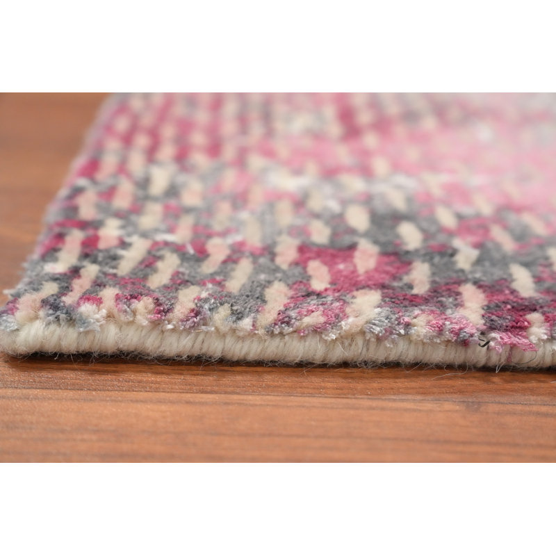 Charmant tapis abstrait rose 2x3 ajoute une touche d'élégance