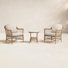 Kyla 3-Piece Wicker Outdoor Seating Group with Side Table and Cushions