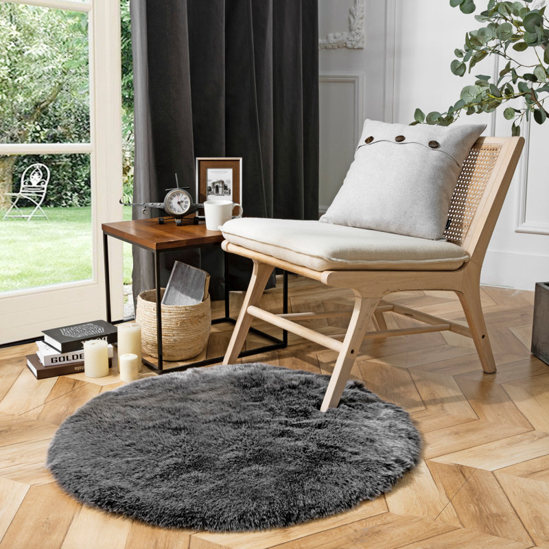 Tapis noir tissé à la machine 2 pi x 3 pi Novelty Jabreel, Rond 3 pi