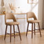 Tabouret de comptoir rembourré en similicuir Ryden avec pieds en bois-907980322