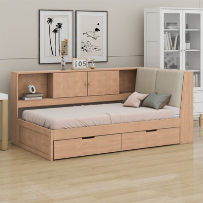 Lit de coin en L en bois avec tiroirs sous le lit avec bibliothèque de rangement et tête de lit tapissier et ports de chargement USB pour un espace limité