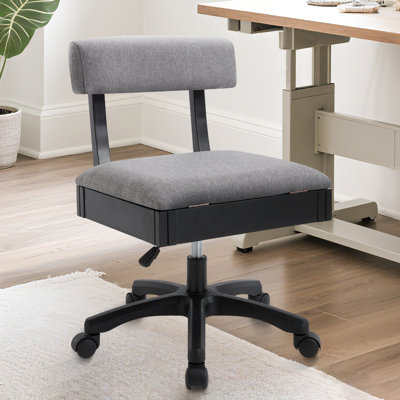 Fauteuil à coudre avec roulettes et rangement sous le siège