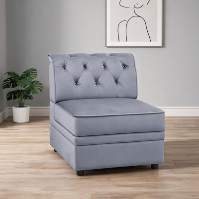 Fauteuil chic en velours gris sans accoudoirs avec motif de boutons