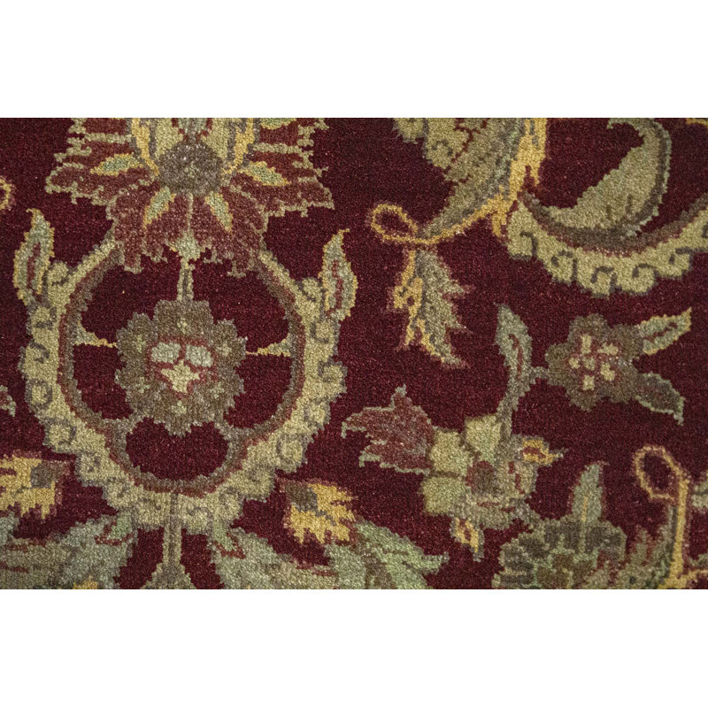 Tapis rouge et or de haute qualité noué à la main